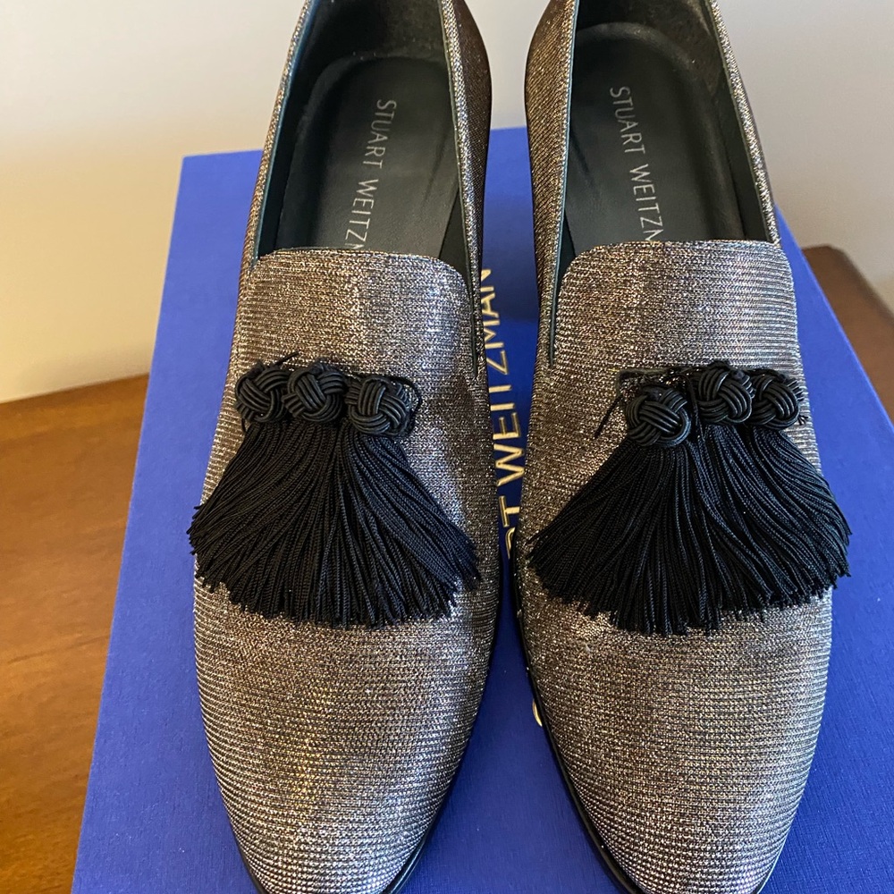 Stuart Weitzman Shimmering Silver Loafers with Black Tassels